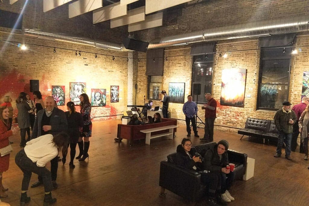 Partygoers enjoy festivities at an artist loft in Chicago