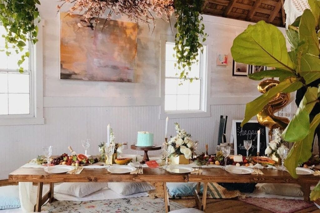 indoor birthday picnic with food and cake