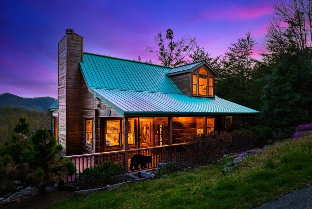 a rustic cabin at dusk